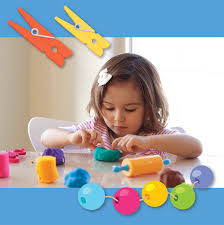 Child learning through play with an educational toy